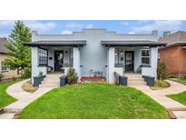Charming bungalow with inviting front porch and well-manicured lawn at 3764 N Raleigh St, Denver, CO 80212