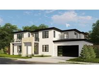 Two-story modern home with a detached garage and balcony at 3820 Pierson Ct, Wheat Ridge, CO 80033