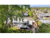 Charming home featuring a large back deck perfect for outdoor entertaining and relaxation at 4381 Dixon Dr, Westminster, CO 80031