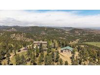 Breathtaking mountain home with separate garage and private location at 13007 Kuehster Rd, Littleton, CO 80127