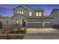 Charming two-story home with a three car garage and beautiful stone accents at 24563 E 34Th Ave, Aurora, CO 80019