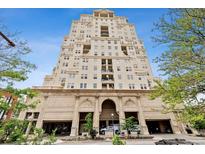 Elegant high-rise building featuring an impressive entrance and beautiful architectural details under a clear blue sky at 300 W 11Th Ave # 15C, Denver, CO 80204