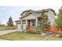 Charming two-story home featuring a well-maintained lawn and inviting front porch at 500 176Th Ave, Broomfield, CO 80023