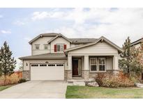 Charming two-story home featuring stone accents, neutral siding, and an attached two car garage in a well-kept neighborhood at 500 176Th Ave, Broomfield, CO 80023