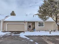 Charming single-story home with a front lawn and attached garage, perfect for suburban living at 13908 E Linvale Pl, Aurora, CO 80014