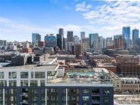 Stunning city views from the rooftop terrace and pool at 1750 Wewatta St # 1301, Denver, CO 80202