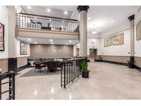 A stylish building lobby featuring a seating area, sleek finishes, and lofted space at 720 16Th St # 207, Denver, CO 80202