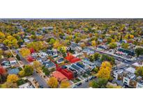 Stunning aerial view of the neighborhood showcasing a vibrant mix of homes and tree-lined streets at 3709 Tejon St, Denver, CO 80211