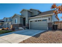 Charming two-story home with modern design, well-manicured landscape, and a two-car garage at 6924 E 118Th Pl, Thornton, CO 80233