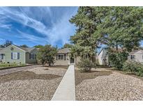 Charming home with a well-manicured front yard and a cozy exterior at 1171 Syracuse St, Denver, CO 80220