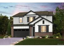 Inviting two-story home with a brick-accented garage and well-manicured front yard at 14075 Bunny Hop Ln, Parker, CO 80134
