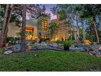 Stunning home exterior showcasing professionally landscaped front yard and architectural stone accents at 1250 Dolan Dr, Monument, CO 80132