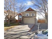 Charming two-story home featuring a two-car garage and a well-maintained front yard at 7732 Xavier Ct, Westminster, CO 80030