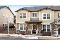 Charming two-story home with a welcoming front porch and stone accents at 2907 Distant Rock Ave, Castle Rock, CO 80109
