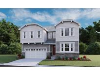 Charming two-story home showcasing stone accents, stylish gray siding, and a bright white garage door at 1434 Lumber Ridge S Cir, Erie, CO 80516