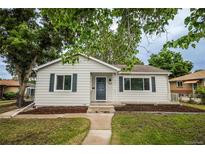 Charming single-story home with a well-maintained front yard and inviting curb appeal at 1809 W Crestline Dr, Littleton, CO 80120