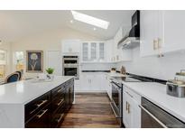 Renovated kitchen featuring new cabinetry, quartz countertops, and stainless steel appliances at 1190 Glencoe St, Denver, CO 80220