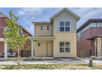 Charming two-story home featuring a covered front porch and modern design elements at 858 Promenade Dr, Superior, CO 80027
