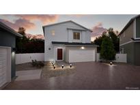 Charming two-story home with a modern design, manicured lawn, and inviting curb appeal at 22172 E 38Th Pl, Aurora, CO 80019