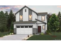 Charming two-story home showcasing modern design, a two-car garage, and inviting curb appeal at 19039 E 94Th Pl, Commerce City, CO 80022