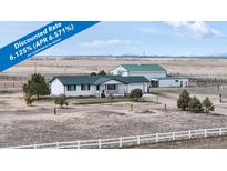 Charming ranch style house with a barn and horse pasture in a rural setting at 32350 E 137Th Way, Brighton, CO 80603