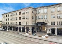 Exterior view of Baker Broadway Building Condos showing the entrance to retail and condo units at 277 N Broadway # 409, Denver, CO 80203