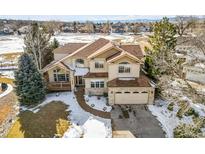 Two-story house with a large yard and attached garage at 3026 W 111Th Dr, Westminster, CO 80031