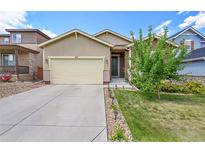 Charming single-Gathering home with a well-manicured lawn and a two-car garage at 675 W 171St Pl, Broomfield, CO 80023