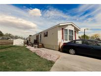 Charming single-Gathering home with landscaped yard and private driveway, perfect for suburban living at 4210 E 100Th Ave # 478, Thornton, CO 80229
