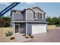 Charming two-story home featuring blue siding, a white garage door, and professionally landscaped front yard at 46505 Sunflower Ln, Bennett, CO 80102