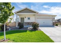 Inviting single-Gathering home with a well-manicured lawn and a two-car garage at 7222 Aspen Brook Ave, Frederick, CO 80530