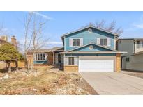 Charming two-story home with a two-car garage and inviting curb appeal at 4121 S Andes Way, Aurora, CO 80013