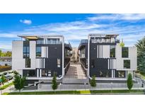 Modern condos boast striking black and white exterior, rooftop terraces, and attractive landscaping at 5125 W 29Th Ave # 5, Denver, CO 80212