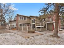Charming condo featuring a private entrance and a classic brick chimney at 857 S Van Gordon Ct # H101, Lakewood, CO 80228
