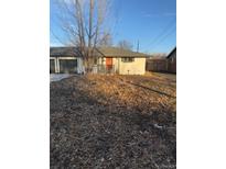 Ranch style home with attached garage and large yard at 4670 Independence St, Wheat Ridge, CO 80033