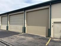 Row of modern storage units, featuring large doors and secure access, ideal for commercial storage at 7152 S Blackhawk St # C12, Englewood, CO 80112