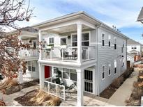 Charming two-story condo with a private balcony and patio area, perfect for enjoying outdoor living at 2773 Roslyn St, Denver, CO 80238