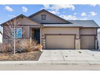 Charming two-story home features a two-car garage and well-maintained landscaping at 5670 Pinto Valley St, Parker, CO 80134