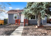 Charming home featuring well-maintained landscaping and a welcoming front porch at 3471 W Exposition Ave, Denver, CO 80219