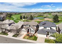 A beautiful aerial view of the property nestled within a golf course community at 4373 E Phillips Pl, Centennial, CO 80122