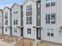 Charming townhomes featuring modern facades, complemented by well-maintained landscaping and inviting entryways at 3458 W 63Rd Ave, Denver, CO 80221