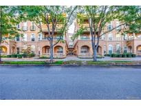 Inviting condo complex with well-maintained landscaping and charming architectural details at 45 N Ogden St # 201, Denver, CO 80218