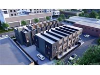 Modern townhome exteriors featuring a contemporary design and convenient parking at 1652 N Lafayette St # 2, Denver, CO 80218