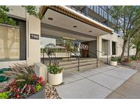 Inviting condo building entrance with a classy design and manicured landscaping at 790 N Washington St # 407, Denver, CO 80203