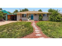 Charming single-story home with landscaped front yard and inviting walkway at 3775 S Green Ct, Englewood, CO 80110
