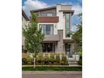 Stunning two-story home boasting a modern design, manicured landscaping, and multiple outdoor terraces at 43 S Oneida Ct, Denver, CO 80230