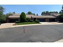 Inviting exterior view showcasing well-maintained townhomes and landscaping at 540 S Forest St # A2, Denver, CO 80246