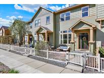 Charming townhome featuring a cozy, fenced front patio, perfect for outdoor relaxation and neighborhood views at 3720 Pecos Trl, Castle Rock, CO 80109