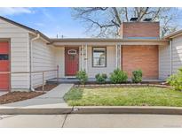 Charming single-story home with a well-maintained front yard and brick chimney at 3198 W Amherst Ave, Denver, CO 80236