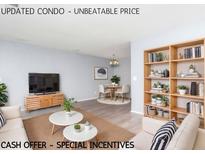 Bright living room features modern decor, open layout, and stylish furnishings, creating a welcoming atmosphere at 10722 E Exposition Ave # 314, Aurora, CO 80012